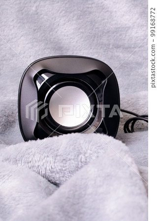 Two small speakers on a gray background Two small speakers on a gray background 99168772