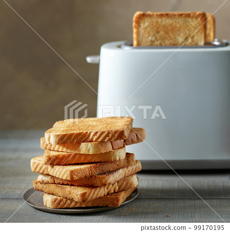 heap of toasted bread slices heap of toasted bread slices 99170195