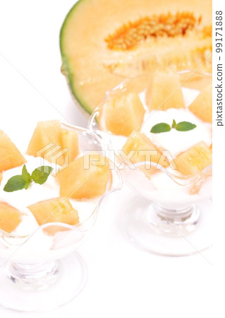 Melon dessert yogurt cut fruit bright background Melon dessert yogurt cut fruit bright background 99171888