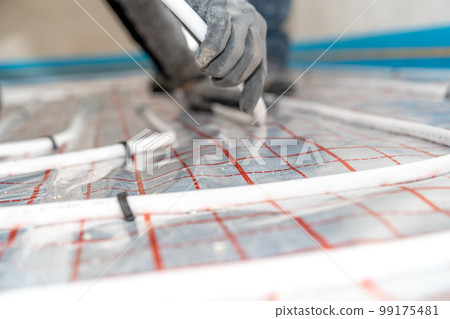 pipes for heating the floor with hot water. close-up detail pipes for heating the floor with hot water. close-up detail 99175481