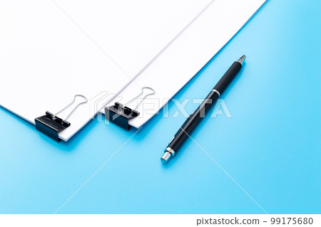 Documents organized in a clip Blue back 99175680