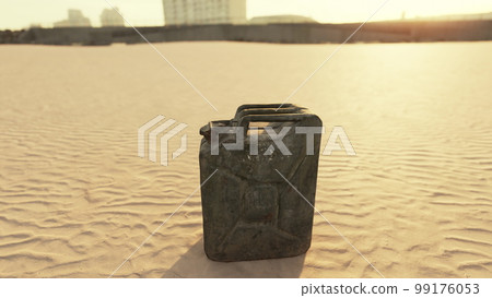 old rusted fuel can on the beach old rusted fuel can on the beach 99176053