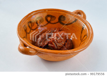 Mexican chile chipotle (pickled in adobo sauce) 99179556