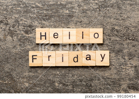 hello friday word written on wood block. hello friday text on cement table for your desing, concept 99180454