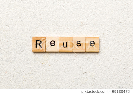 reuse word written on wood block. reuse text on cement table for your desing, concept 99180473
