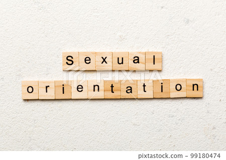 Sexual orientation word written on wood block. Sexual orientation text on cement table for your desing, concept 99180474