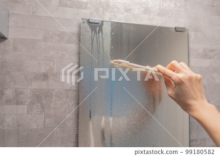 A woman's hand draining the bathroom A woman's hand draining the bathroom 99180582