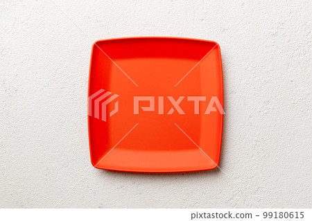 Top view of empty square plate on cement background. Empty space for your design Top view of empty square plate on cement background. Empty space for your design 99180615
