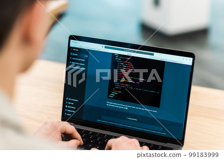 Software developer generating code in an AI chat 99183999