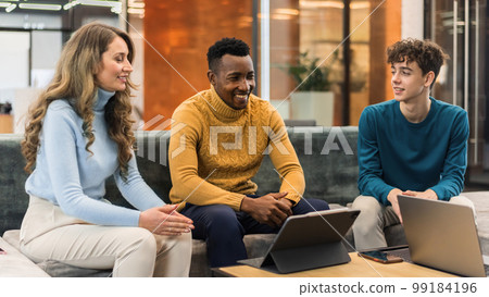 Multiracial group of people discussing business in an office 99184196