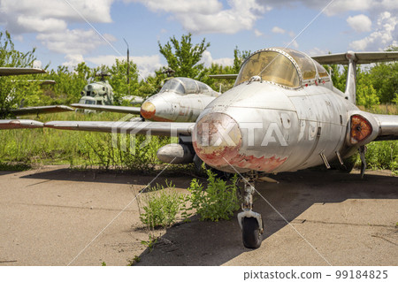 Old abandoned airfield with abandoned planes. Abandoned rusty old planes Old abandoned airfield with abandoned planes. Abandoned rusty old planes 99184825