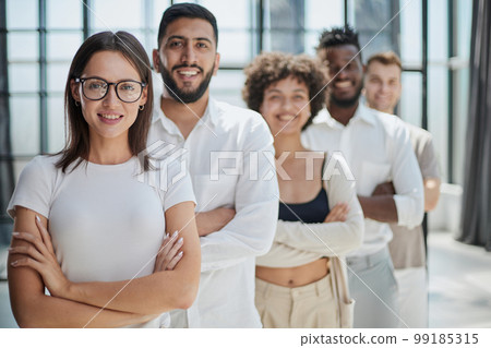 Smiling professional business leaders and employees group team portrait Smiling professional business leaders and employees group team portrait 99185315