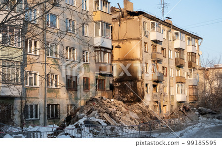 Multi-storey building after the explosion and fire. Entire hallway collapsed Multi-storey building after the explosion and fire. Entire hallway collapsed 99185595
