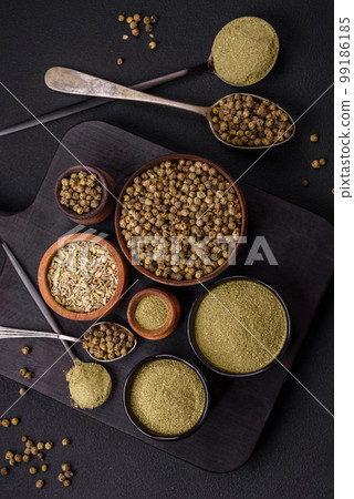 Spice dried dill or basil in the form of green powder 99186185