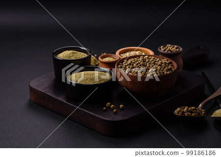 Spice dried dill or basil in the form of green powder 99186186