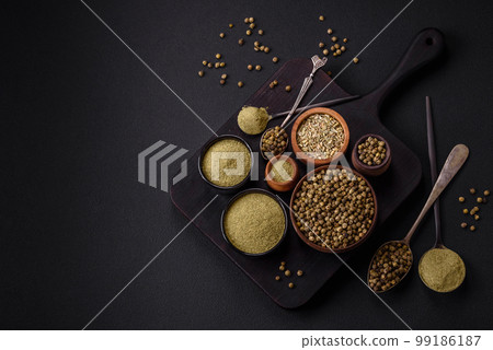 Spice dried dill or basil in the form of green powder 99186187