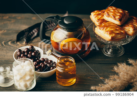 Homemade pastries on beautifully served table decorated in rustic style Homemade pastries on beautifully served table decorated in rustic style 99186904