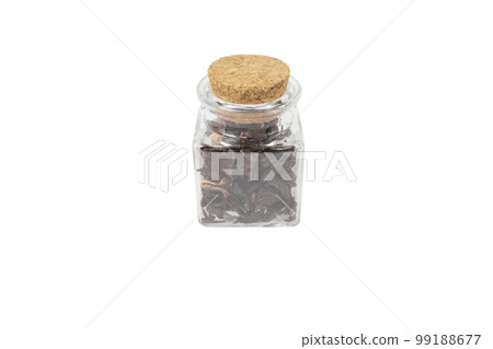Dry hibiscus tea in a glass jar isolated on white background. herb. herbal tea. food ingredient. Dry hibiscus tea in a glass jar isolated on white background. herb. herbal tea. food ingredient. 99188677