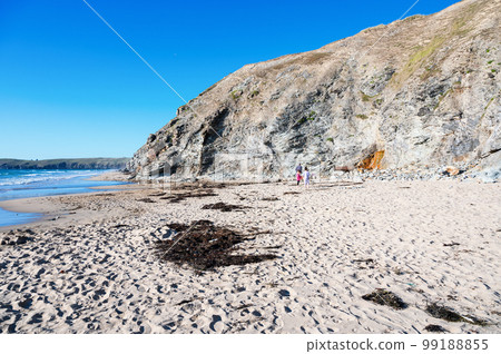 Sandy beach of Perranporth in West Cornwall, South West England. View of the beach, blue sea and cliffs. Selective focus 99188855