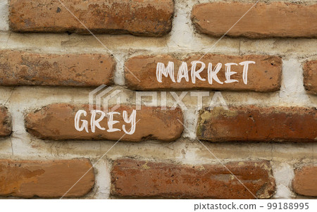 Grey market symbol. Concept words Grey market on red brown brick wall. Beautiful red brown brick wall background. Business grey market concept. Copy space. Grey market symbol. Concept words Grey market on red brown brick wall. Beautiful red brown brick wall background. Business grey market concept. Copy space. 99188995