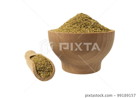 dried common chamomile flowers in latin - Matricaria chamomilla in wooden bowl and scoop isolated on white background. Medicinal herb. dried common chamomile flowers in latin - Matricaria chamomilla in wooden bowl and scoop isolated on white background. Medicinal herb. 99189157