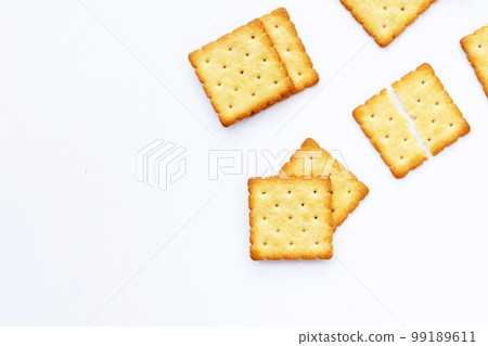 Dry cracker cookies on white background. Dry cracker cookies on white background. 99189611