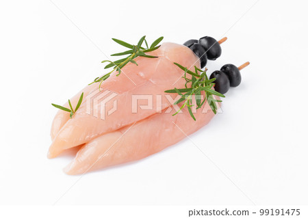 Chicken Skewers breast fillet meat.Uncooked Chicken meat,kebab on skewers.Skewers of raw meat and vegetables.Top view.Raw chicken inner on skewers with olives with herbs on white background. 99191475