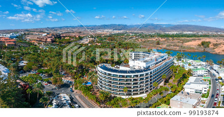 Beautiful luxury hotel concept. Holidays in Spain in a fabulous hotel with infinity pool and near by beach line. Aerial cinematic view. 99193874