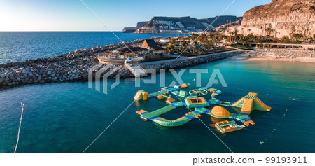Aerial view of the Amadores beach on the Gran Canaria island in Spain. The most beautiful beach on the Canary islands. 99193911