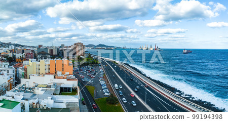 Panoramic aerial view of Las Palmas de Gran Canaria and Las Canteras beach at sunset, Canary Islands, Spain. 99194398