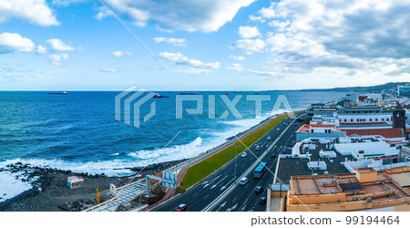 Panoramic aerial view of Las Palmas de Gran Canaria and Las Canteras beach at sunset, Canary Islands, Spain. Panoramic aerial view of Las Palmas de Gran Canaria and Las Canteras beach at sunset, Canary Islands, Spain. 99194464
