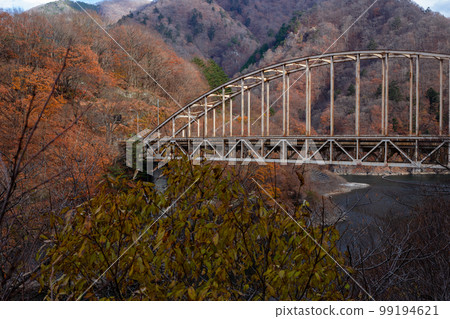 Late autumn scenery with a bridge Yunishi River Kaijiri Bridge Late autumn scenery with a bridge Yunishi River Kaijiri Bridge 99194621