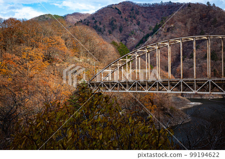 Late autumn scenery with a bridge Yunishi River Kaijiri Bridge Late autumn scenery with a bridge Yunishi River Kaijiri Bridge 99194622
