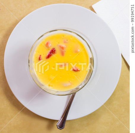 Vanilla mousse with strawberry 99194751