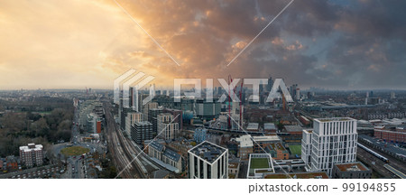 Aerial London Skyline view near Battersea Power Station in London. Cloudy weather over London. Aerial London Skyline view near Battersea Power Station in London. Cloudy weather over London. 99194855