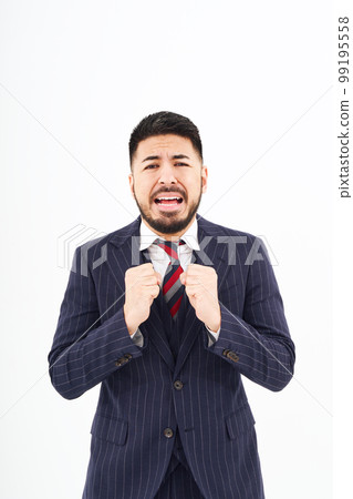 A man in a suit with a sad expression A man in a suit with a sad expression 99195558