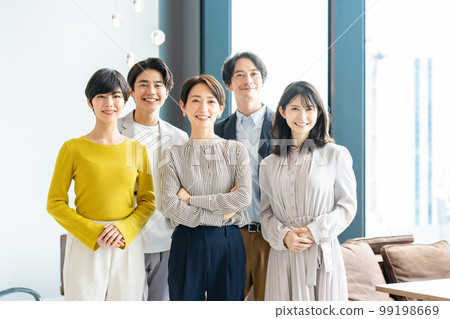 Business person male and female arms folded Business person male and female arms folded 99198669