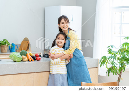 Good friends and parents cooking in the kitchen 99199497