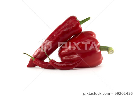 Fresh chili peppers and red bell peppers over white Fresh chili peppers and red bell peppers over white 99201456