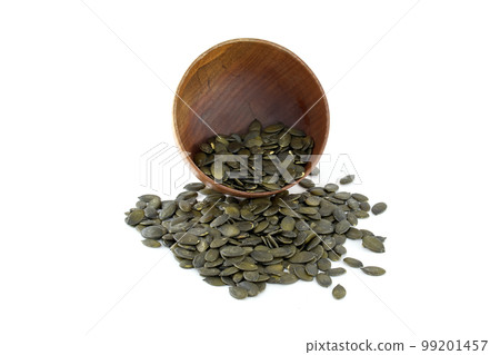 Shelled pumpkin seeds isolated on white background Shelled pumpkin seeds isolated on white background 99201457