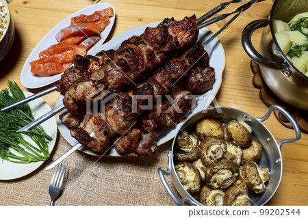 russian feast, kebab and boiled potatoes traditional Russian food 99202544