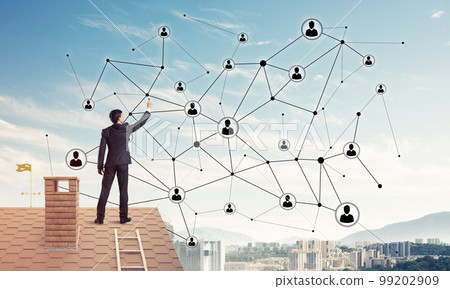 Businessman on house roof presenting networking and connection c 99202909