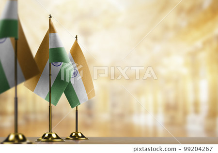 Small flags of the India on an abstract blurry background 99204267