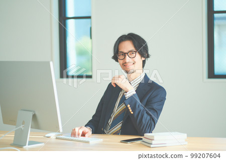 Man doing remote work Man doing remote work 99207604