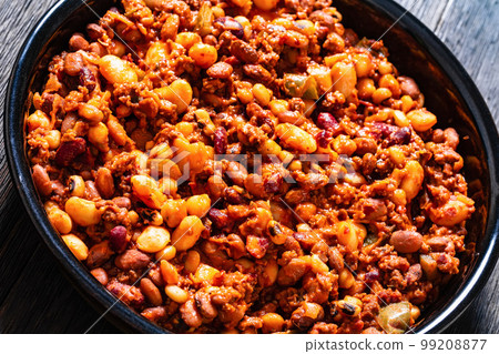 Beans and Sausage bake in baking dish, top view Beans and Sausage bake in baking dish, top view 99208877