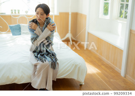 The woman in the bedroom The woman in the bedroom 99209334