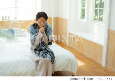 The woman in the bedroom The woman in the bedroom 99209335