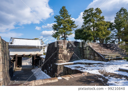 Nijo Castle Honmaru Yagura Turret Gate with snow in winter. Kyoto, Japan. Nijo Castle Honmaru Yagura Turret Gate with snow in winter. Kyoto, Japan. 99210848
