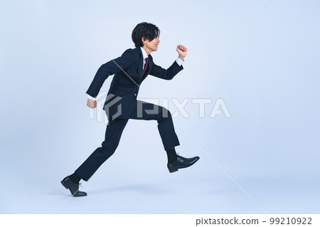 A young businessman starting to run (Cutout PNGs are also on sale! See author profile) A young businessman starting to run (Cutout PNGs are also on sale! See author profile) 99210922