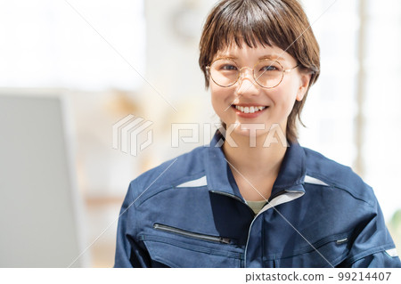 Young engineer working with monitor during training 99214407
